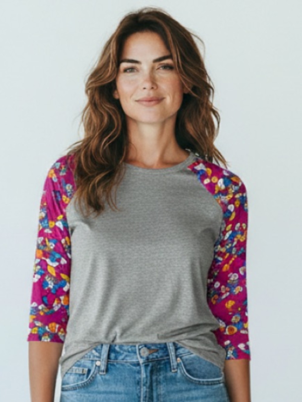 Woman’s LuLaRoe Disney Raglan Tee with Pink Purple Donald Duck Print Sleeves